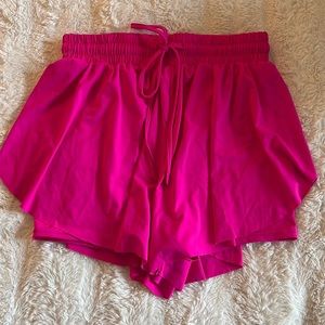 Hot pink shorts with lined spandex